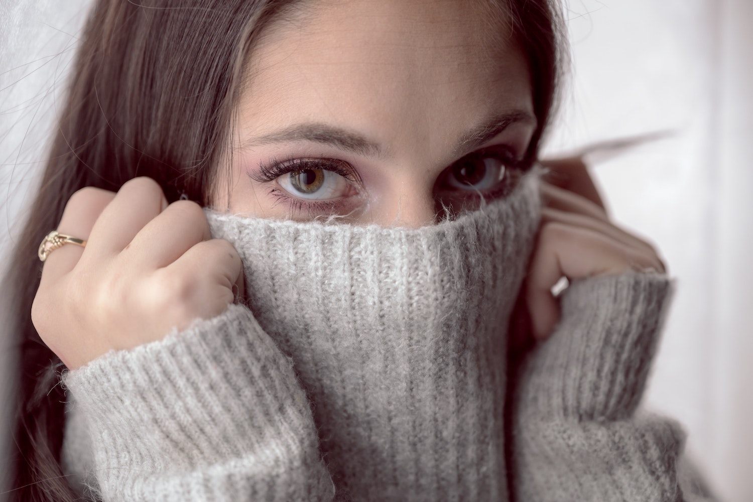 woman covering fear eyes